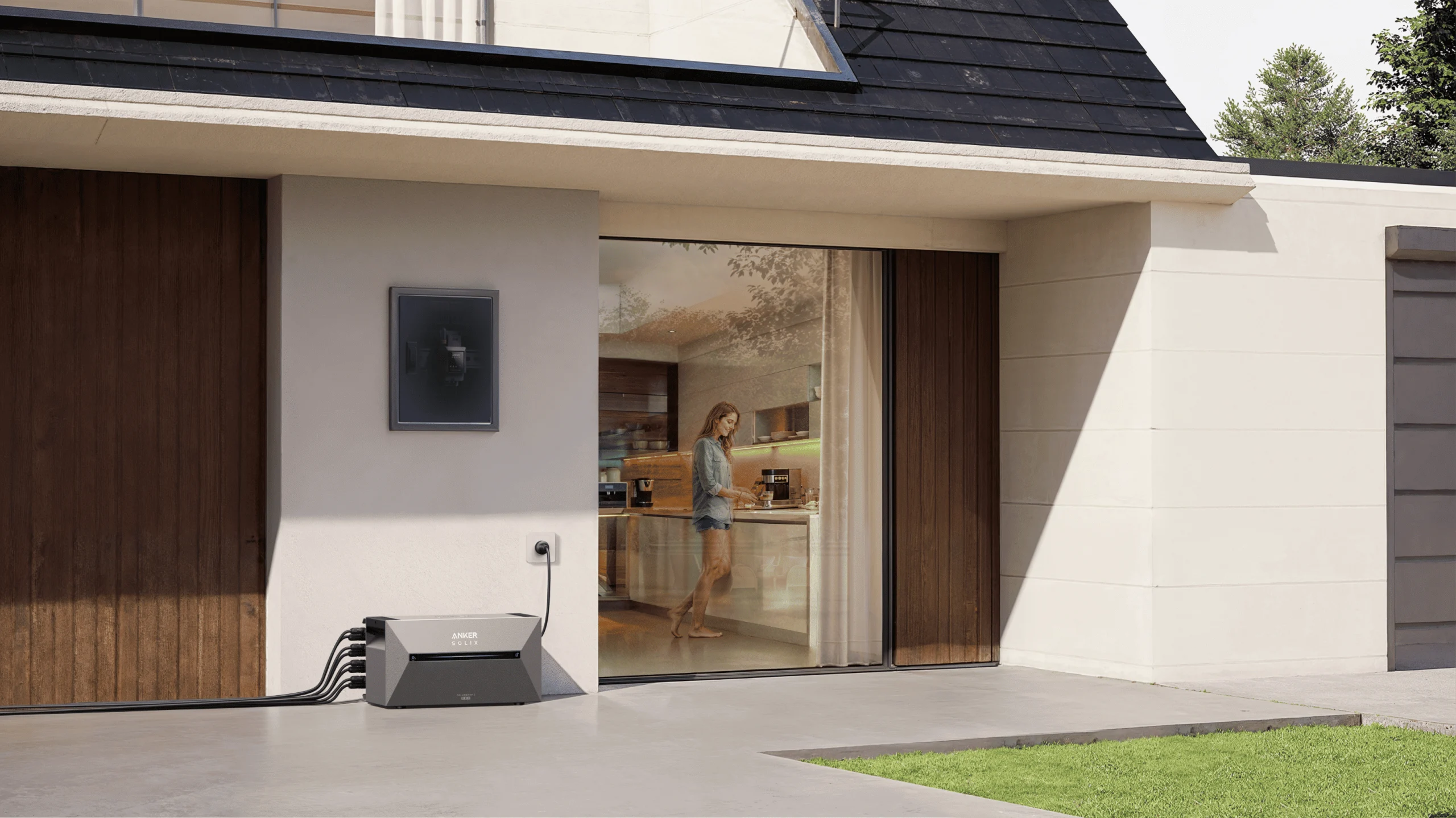 installation-d_une-batterie-Solarbank-2-E1600-Pro-devant-une-maison-au-sol-et-protégée